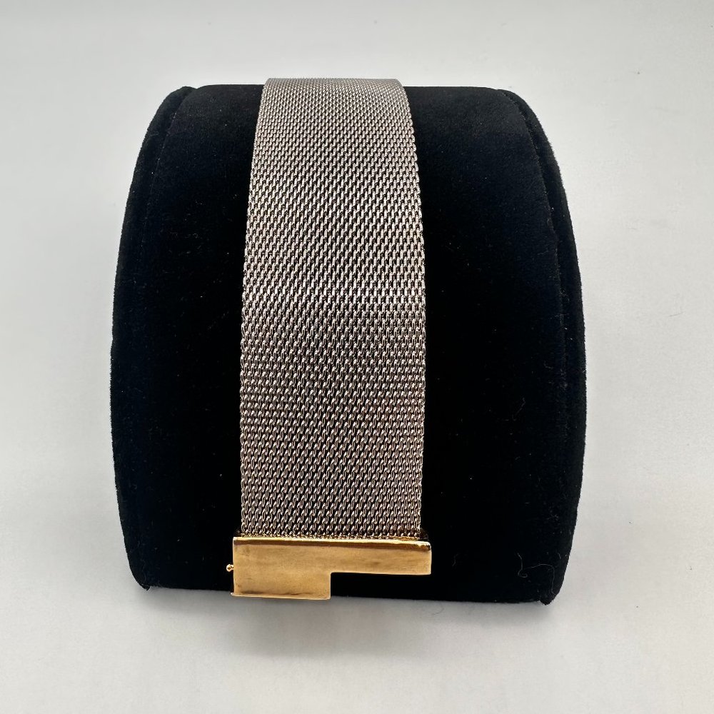 Elegant Gold Cuff Bracelet with Intricate Detailing